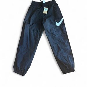 Nike Women's Black Joggers with Light Blue Swoosh